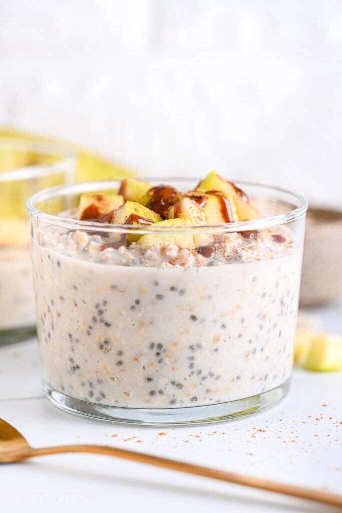 Creamy cottage cheese overnight oats with apple and nut butter as topping