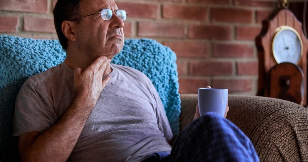 What To Know About The 'Razor Sore Throat' COVID Symptom