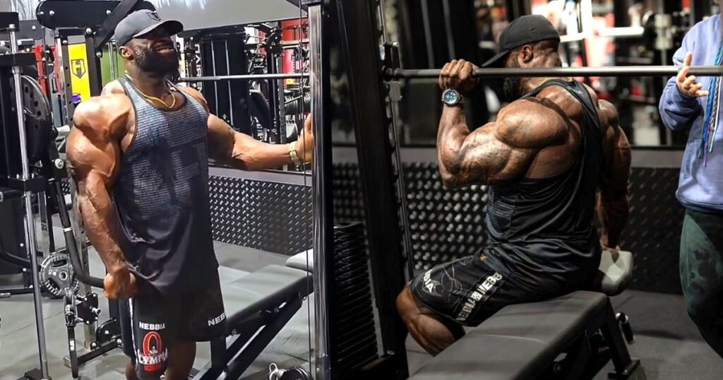 Samson Dauda’s Shoulder Hacks: 2 Machine Moves to Retain His Olympia Title Samson Dauda’s Shoulder Hacks: 2 Machine Moves to Retain His Olympia Title