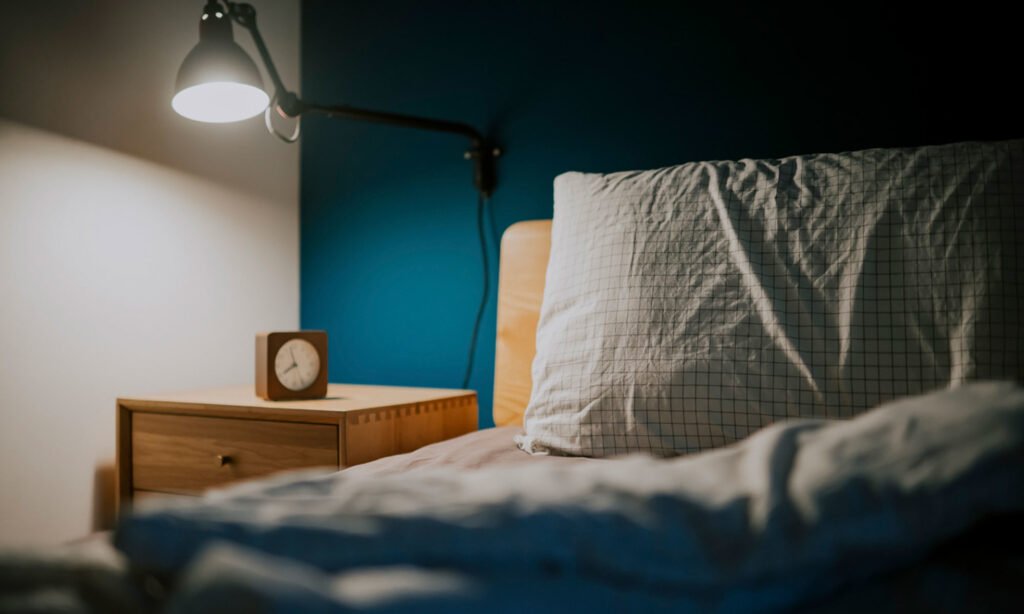 5 Ways To Get Deep Sleep When You're Not In Your Own Bed