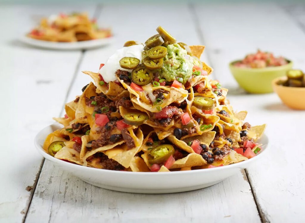 5 Chain Restaurants Famous for Heaping Nacho Trays 5 Chain Restaurants Famous for Heaping Nacho Trays